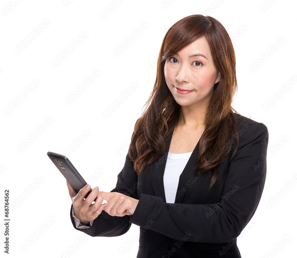 Businesswoman touch on the screen of celllphone Businesswoman touch on the screen of celllphone