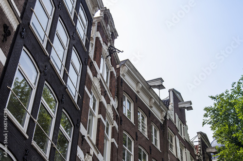 Amsterdam, Netherlands. A typical facade of the old houses photo