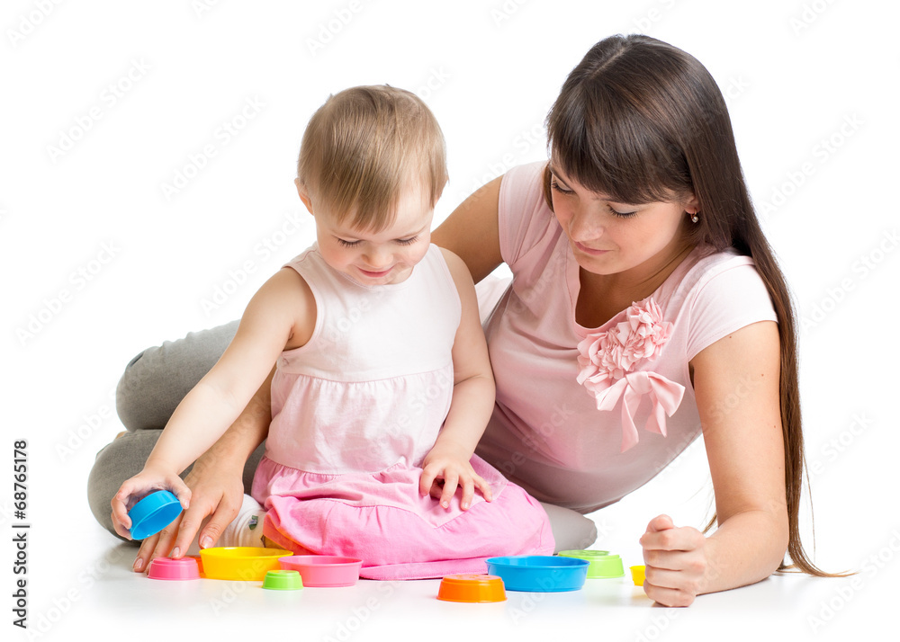 mother and daughter play together with cup toys mother and daughter play together with cup toys