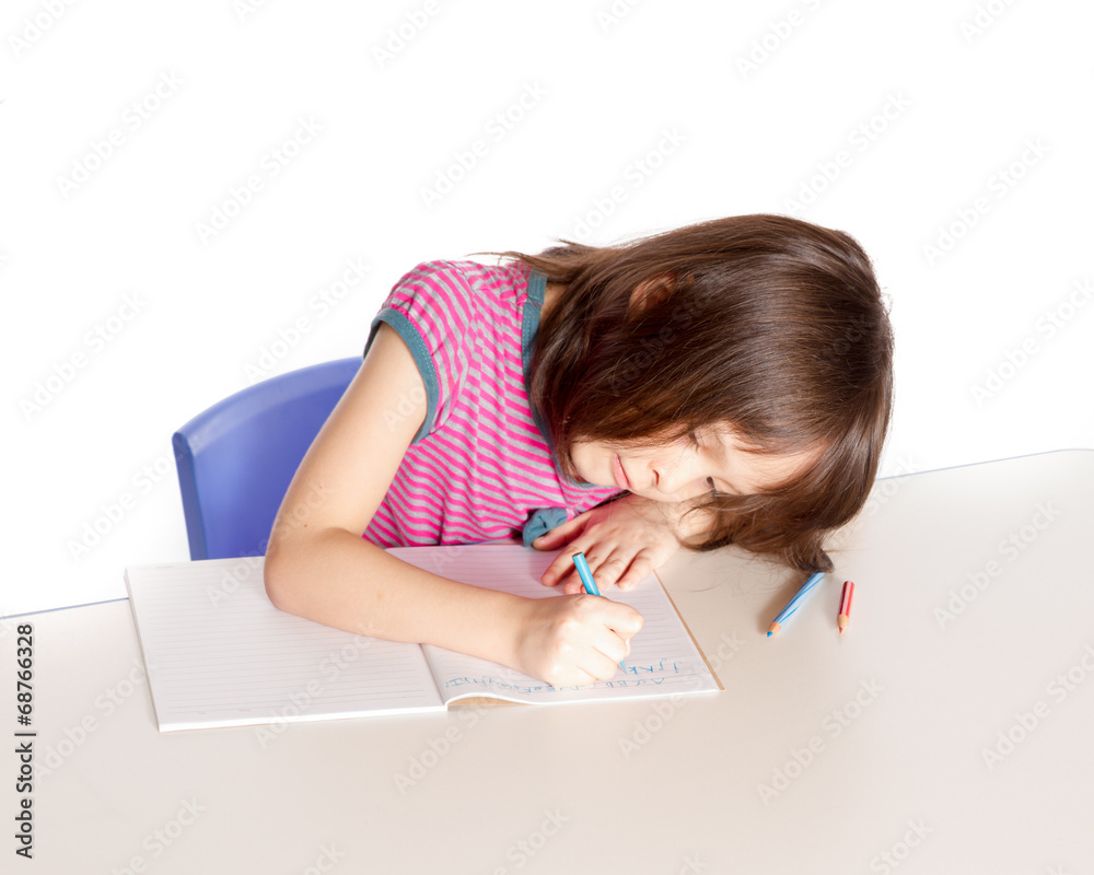 Girl doing homework at desk