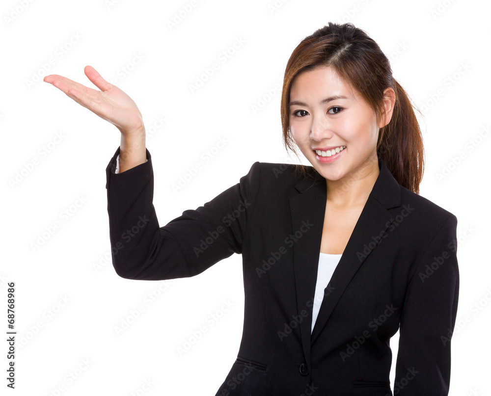 Young asian businesswoman with hand showing blank sign Young asian businesswoman with hand showing blank sign