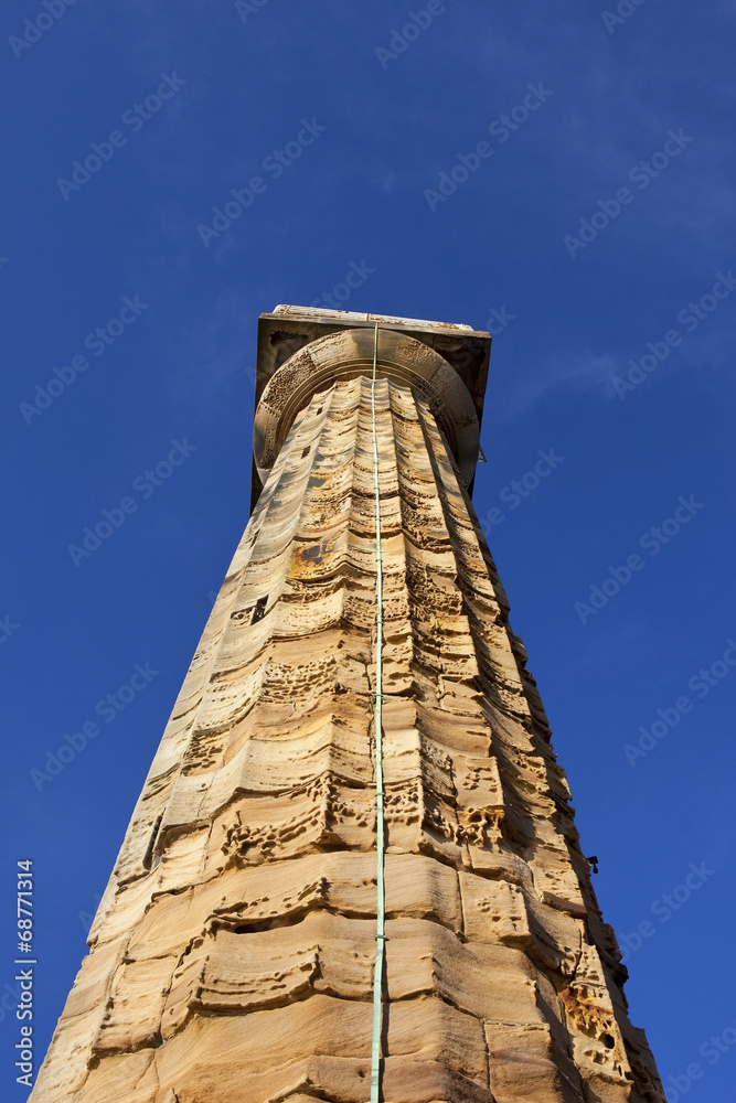 weathered stone light tower