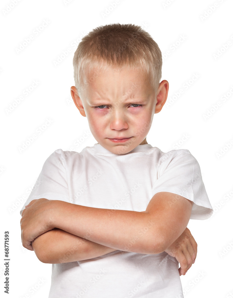 Boy with frowning face Boy with frowning face
