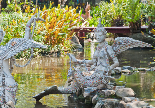 The Gandharvas in Thai style on the water photo