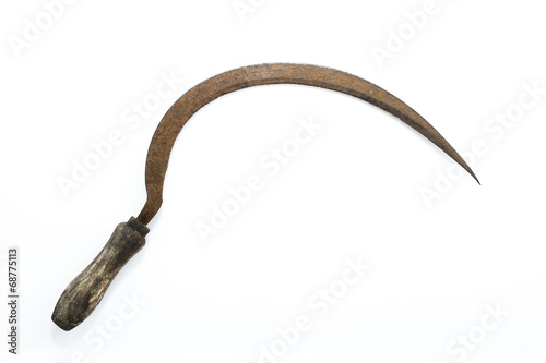 Old sickle isolated photo