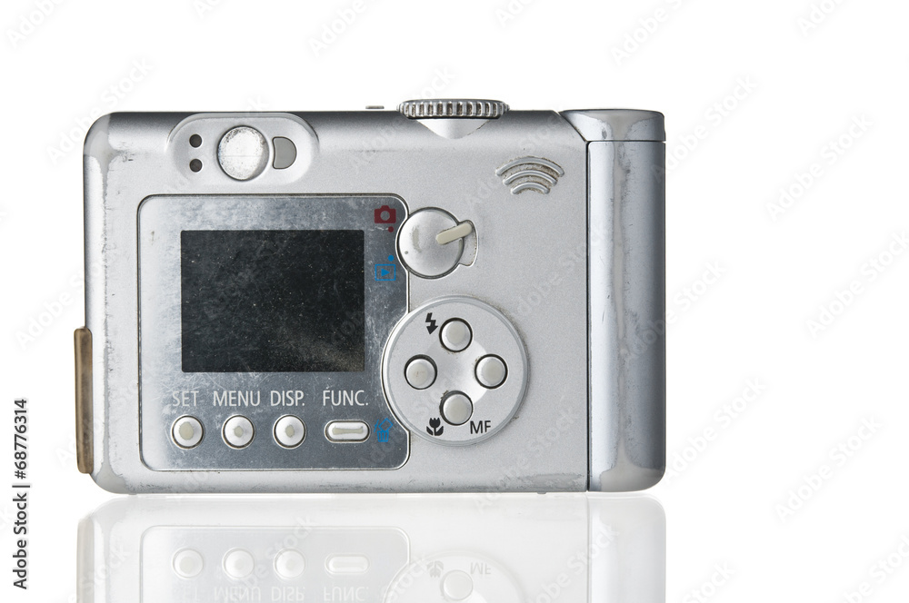 Grunge compact photo camera on white backdrop Grunge compact photo camera on white backdrop