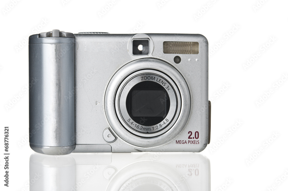 Old-fashioned dirty compact photo camera on white background Old-fashioned dirty compact photo camera on white background