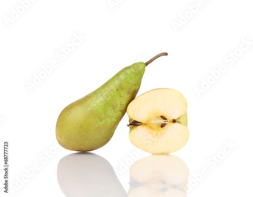 Halved apple and ripe beautiful pear.