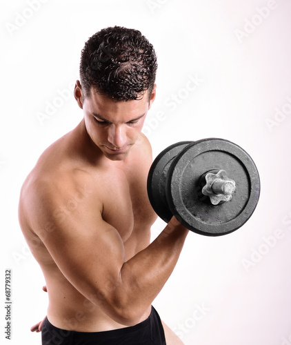 Man with dumbbells weights doing bieps exercise