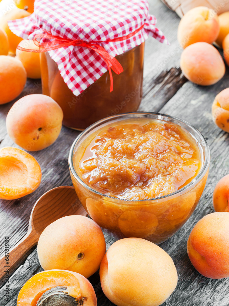 apricot fruits and jar of jam on table apricot fruits and jar of jam on table