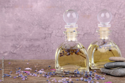 Fototapeta Naklejka Na Ścianę i Meble -  Spa still life with lavender oil and flowers