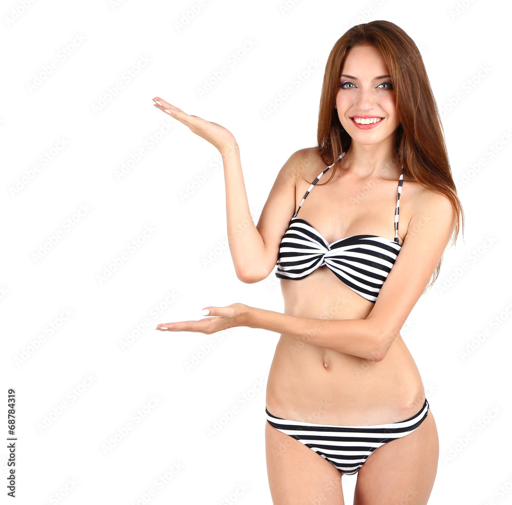 Beautiful young woman in swimsuit isolated on white Beautiful young woman in swimsuit isolated on white