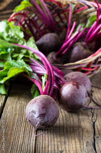 Fresh vegetables beetroot on  wooden background photo