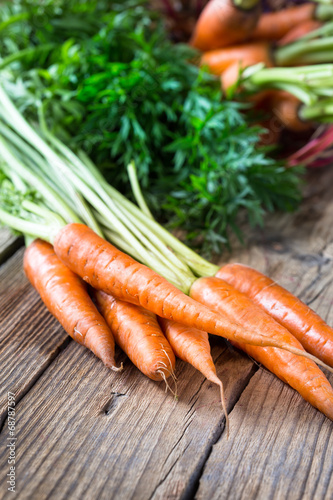 Fresh vegetables carrot on  wooden background