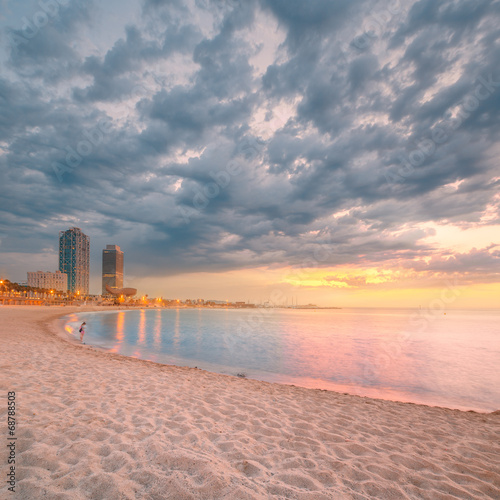 Photography Barceloneta Beach in Barcelona at sunrise