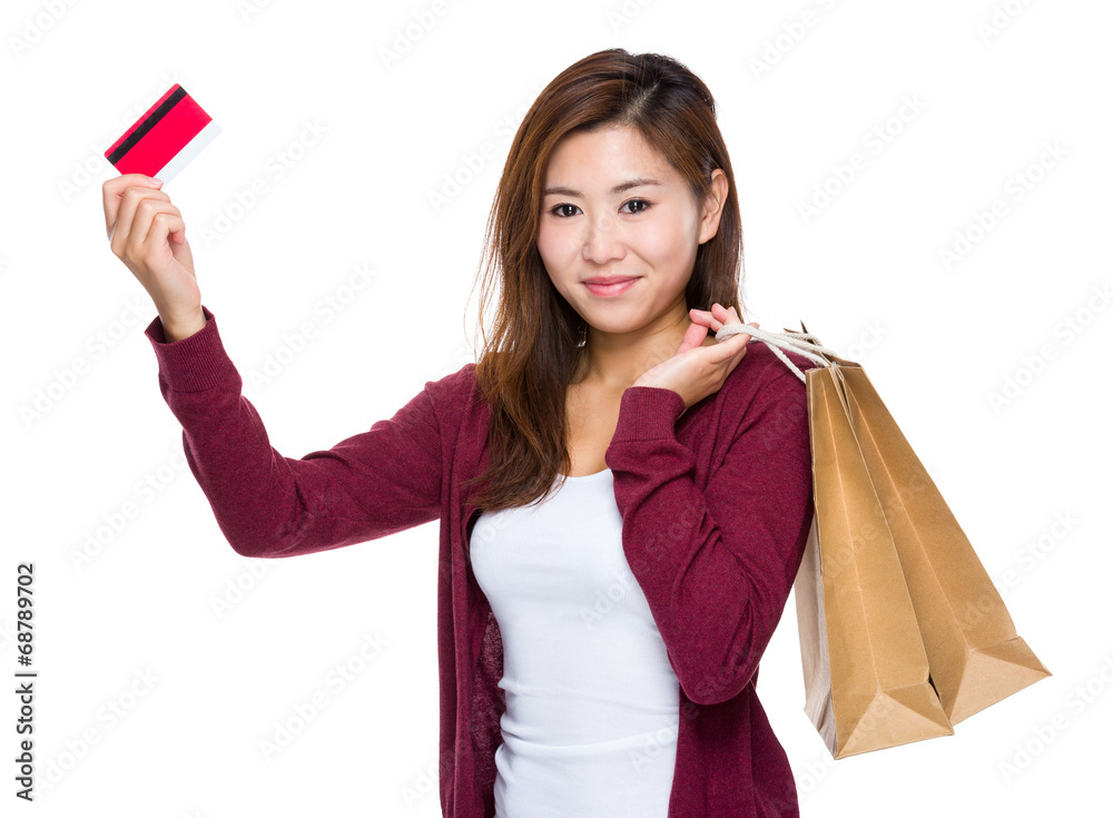Happy girl with shopping bag and credit card Happy girl with shopping bag and credit card