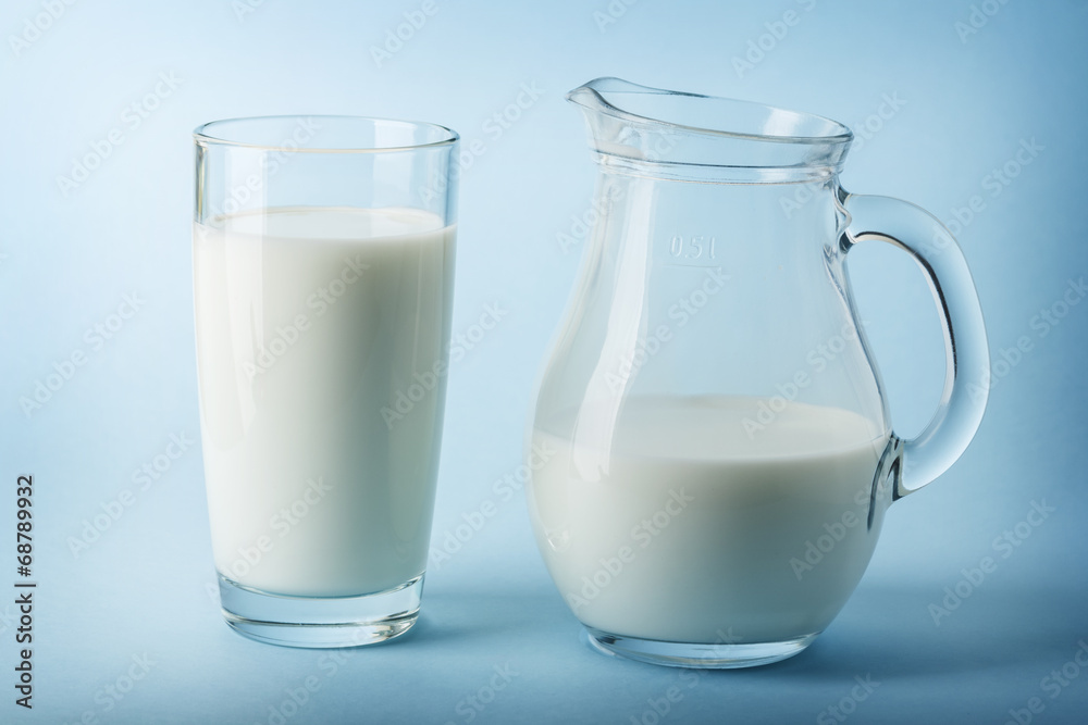 Glass jug and glass with milk Glass jug and glass with milk