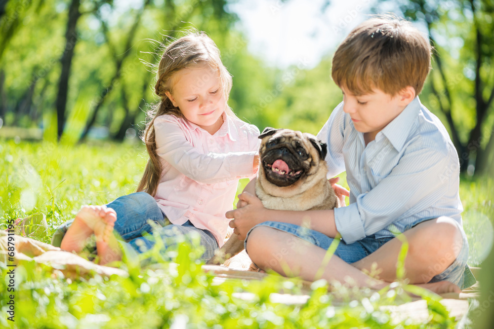 Children in park with pet Children in park with pet