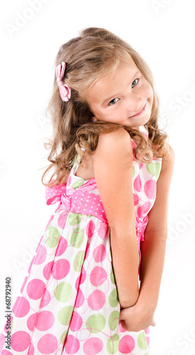 Adorable smiling little girl in princess dress isolated