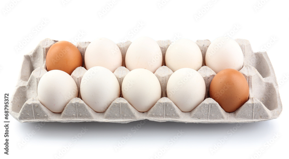 Different eggs in carton pack isolated on white Different eggs in carton pack isolated on white