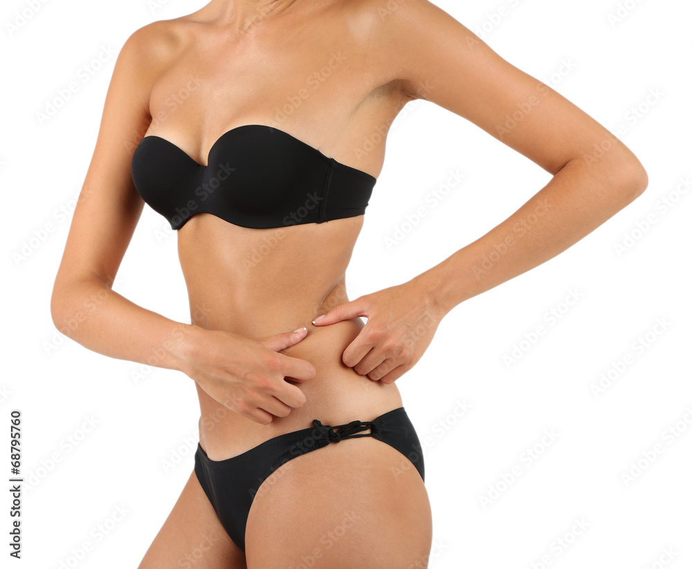 Young woman with slim body isolated on white