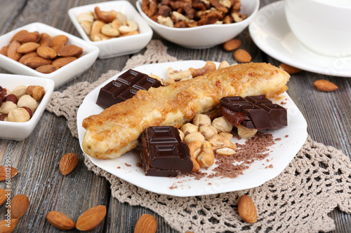 Sweetened fried banana on plate, close-up