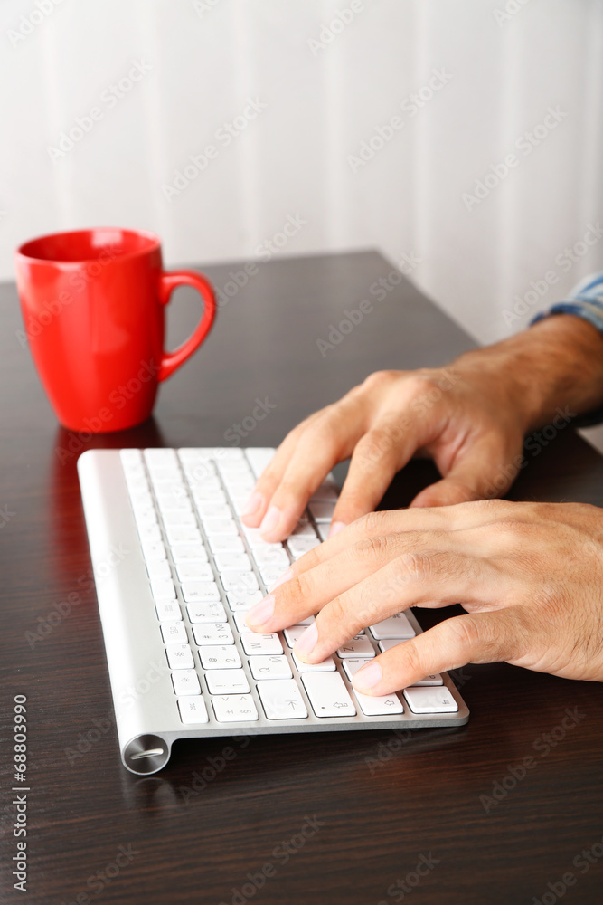 Man working with keyboard