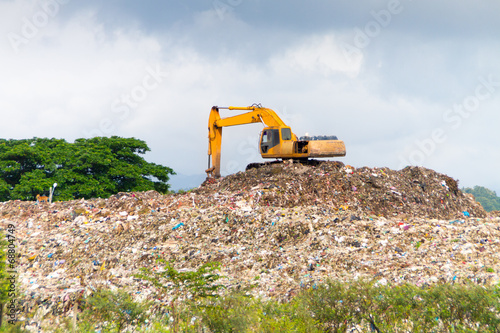 Landfill truck working on dumpsite
