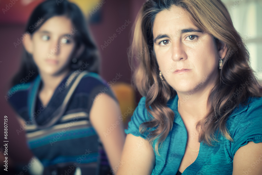 Worried mother and her teenage daughter Worried mother and her teenage daughter