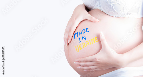 Obraz na płótnie Pregnant belly with