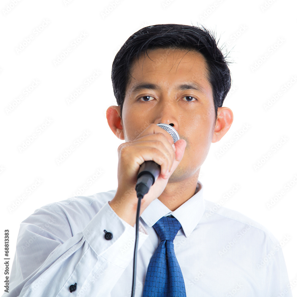 Hand holding a microphone