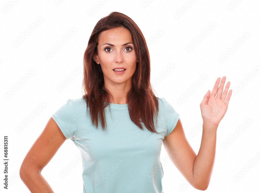 Positive brunette female with greeting hand Positive brunette female with greeting hand