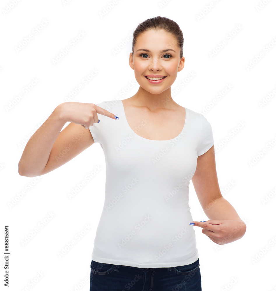 smiling young woman in blank white t-shirt