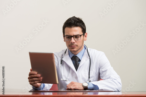 Doctor On A Break With His Computer