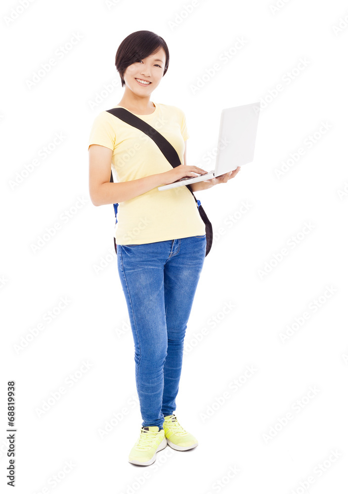 Smiling young woman holding a laptop and isolated on white Smiling young woman holding a laptop and isolated on white