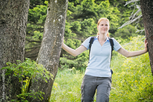 Woman Hiking in a Forest