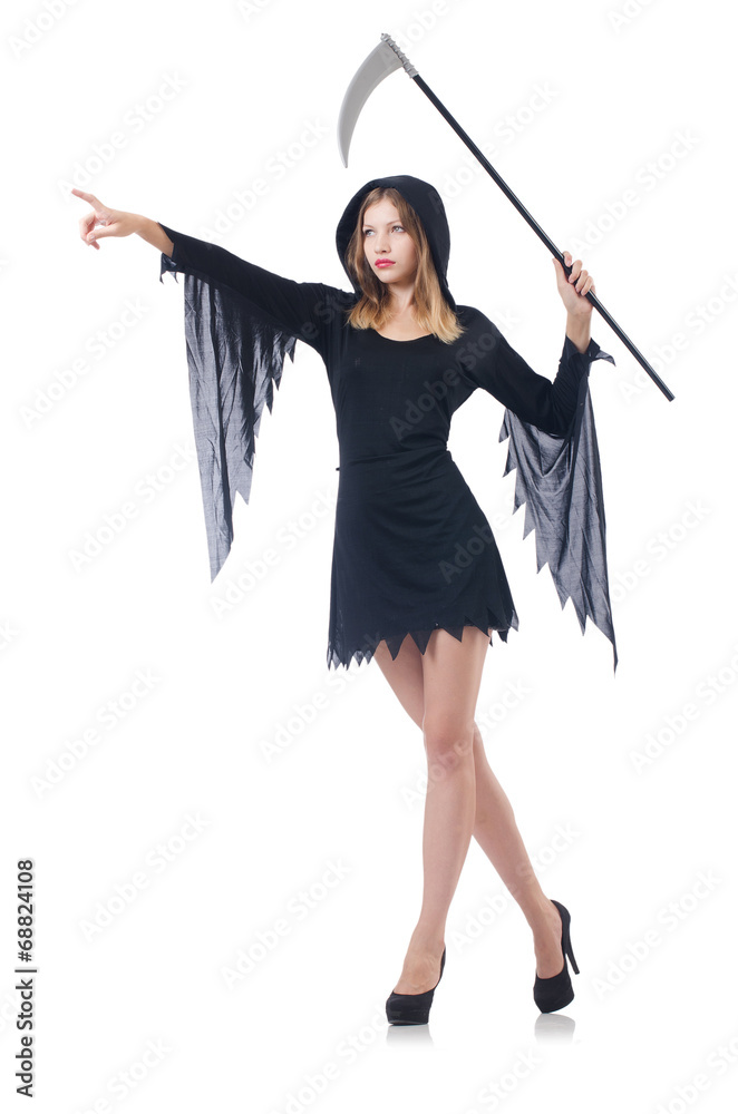 Woman in halloween concept with scythe Woman in halloween concept with scythe