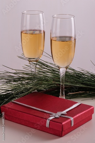 Gift box with champagne in romatic atmospfer photo