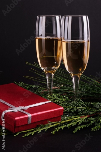 Gift box with champagne in romatic atmospfer photo