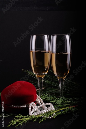 Pearl in Red Gift boxes with champagne in romatic atmospfer photo