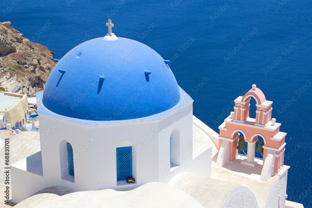 Blue roof church on Santorini island, Greece