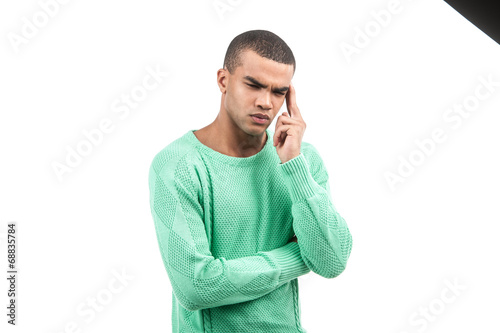 African american with head pain and green shirt. photo