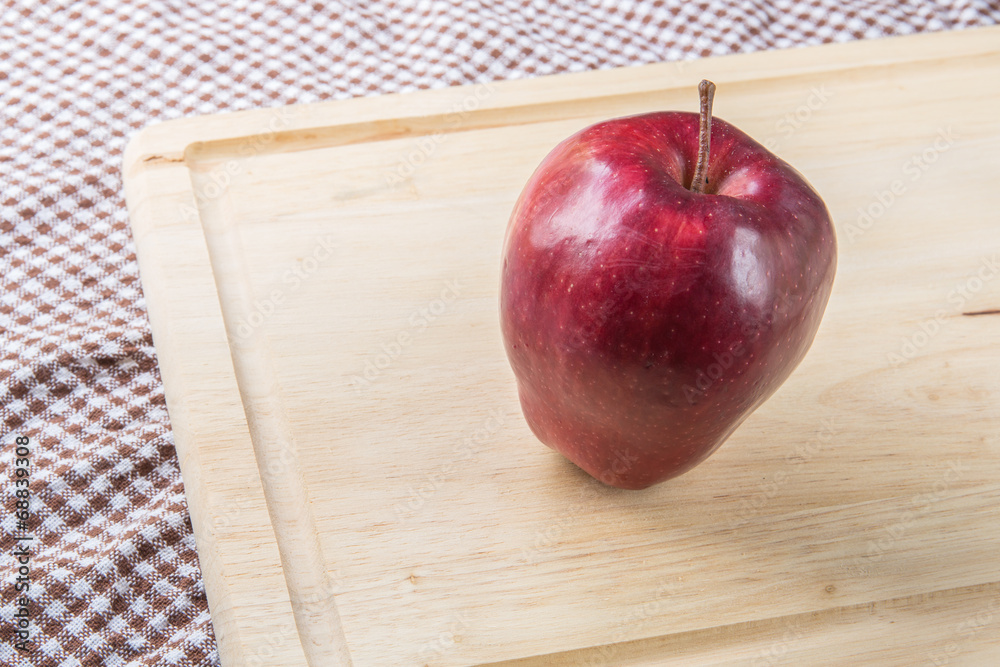 Red ripe apple on wood Red ripe apple on wood