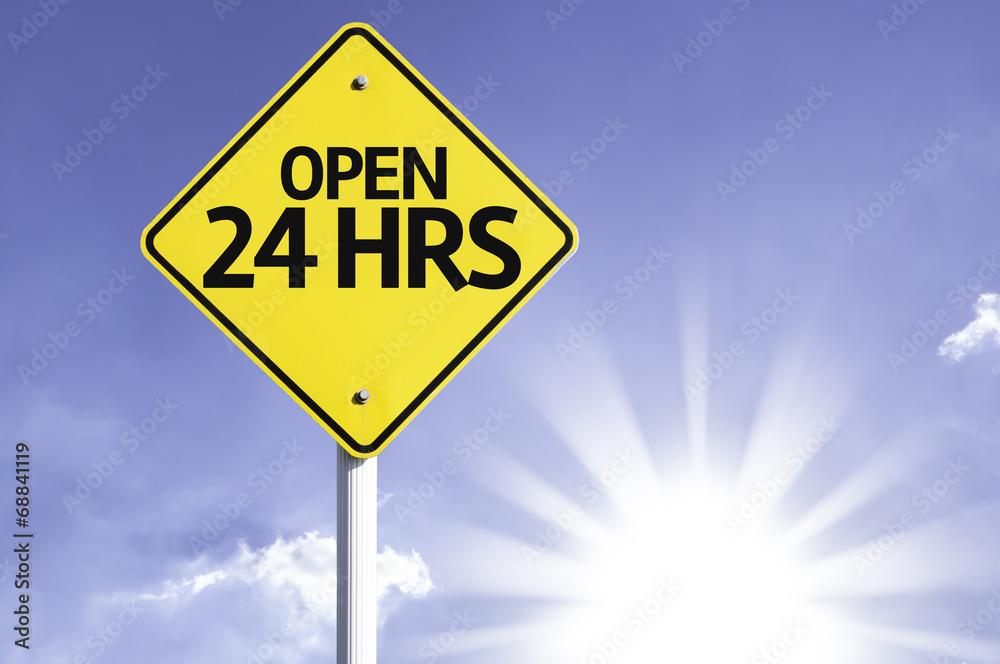 Open 24Hrs road sign with sun background Open 24Hrs road sign with sun background