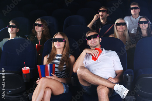 Young people watching movie...