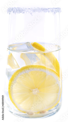 Glass of water with lemon on white background isolated