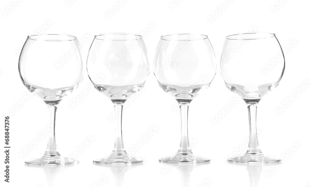 Empty wine glasses isolated on white