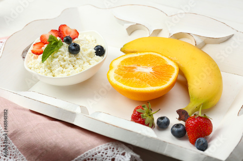 Delicious breakfast with cottage cheese and fruits