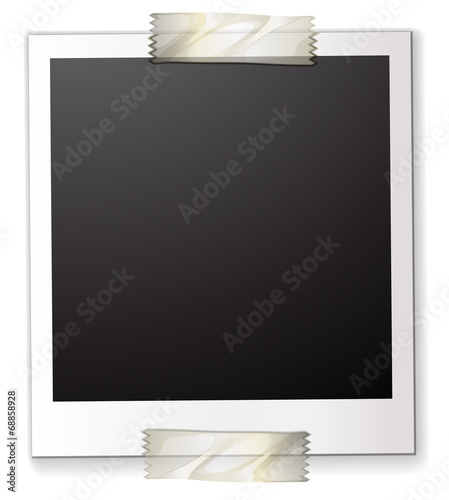 A polaroid attached to a piece of paper