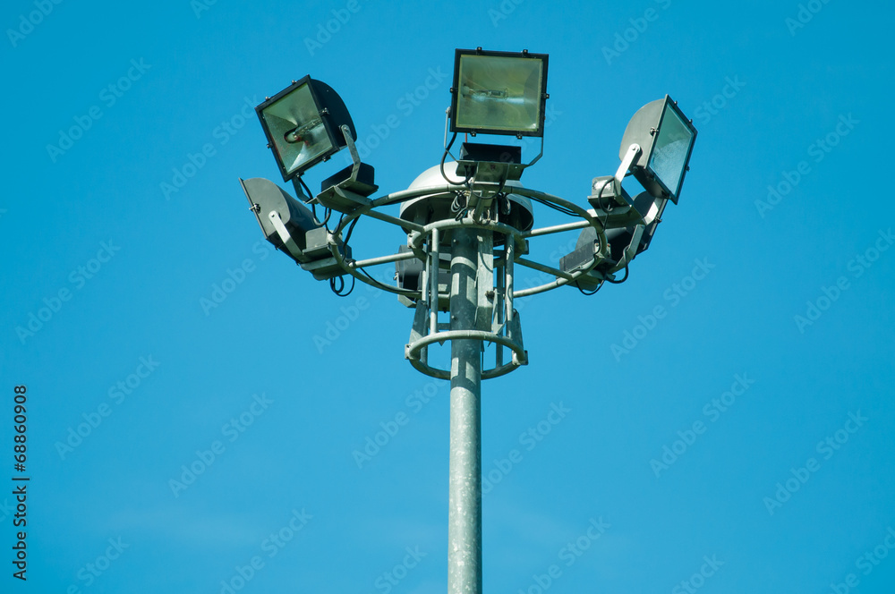 multiple sport light with blue sky background multiple sport light with blue sky background